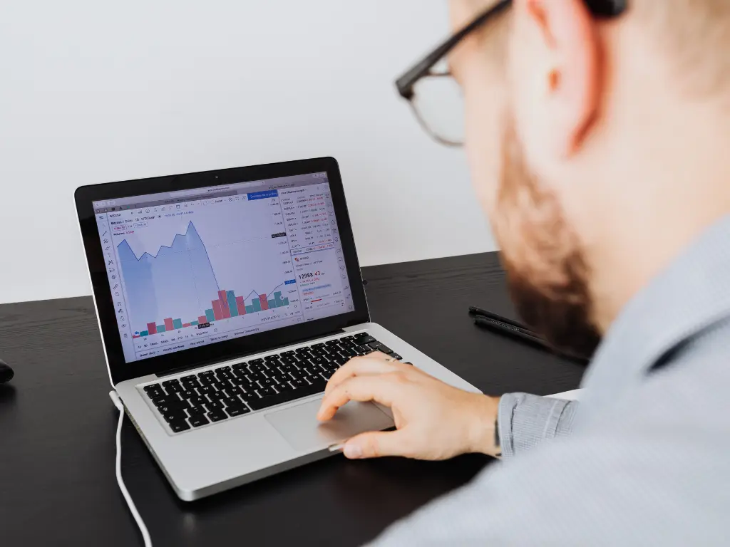 GBP Optimization 1 Business owner analyzing Google Business Profile performance